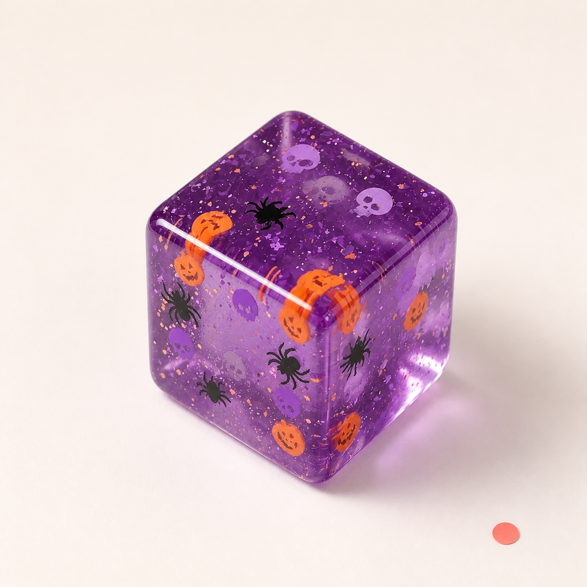 Close detail of the Halloween Character Cube Squishy prints and glitter