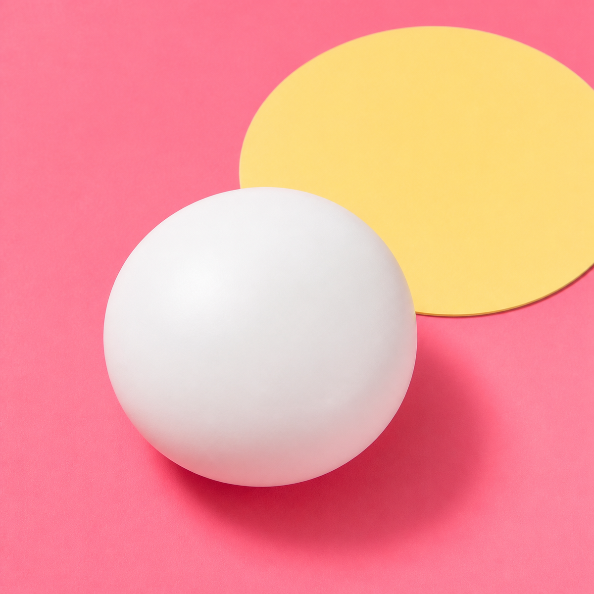 Soft White Bun Squeeze Ball on a branded pink campaign set