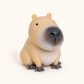 Tan stretchy capybara squishy with grey muzzle and textured belly on warm white